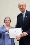 Dr. Janice Coons, Biological Sciences, with Dr. William L. Perry, President by Beverly J. Cruse