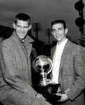 Basketball Players with NAIA Trophy, 1957 by University Archives