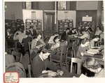 Original Library in Old Main (Magazine Racks in Reserve Reading Room) by University Archives
