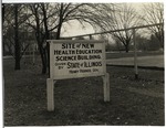 Health Education Building Site Sign by University Archives