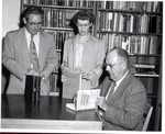 President Robert G. Buzzard with Booth Library Faculty by University Archives