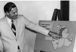 President Daniel Marvin with Map of Mid-Continent Athletic Association Sites by University Archives