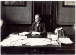 President Livingston C. Lord Seated at His Desk by University Archives