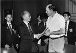 President Daniel Marvin with Foreign Visitors, Receiving Gift by University Archives