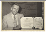 President Daniel Marvin with Diploma from Hanyang University by University Archives