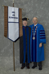 Dr. Roger Beck, Faculty marshal, Dr. William L. Perry, President