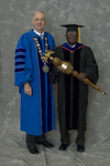 Dr. William L. Perry, President, Dr. Godson C. Obia, Commencement marshal by Beverly J. Cruse