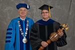 Dr. William L. Perry, President, Dr. Reed Benedict, Commencement marshal