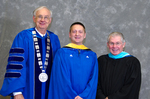 Dr. William Perry, University President, Mr. David Closson, Student Speaker, Mr. Ken Baker, Student Speaker Mentor by Beverly J. Cruse