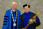 Dr. William Perry, University President, Dr. Andrew Robinson, Commencement Marshal by Beverly J. Cruse