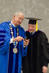 Dr. William L. Perry, University President, Dr. William Addison, Faculty Marshal by Beverly J. Cruse
