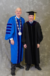 Dr. William L. Perry, University President, Dr. William Addison, Faculty Marshal by Beverly J. Cruse