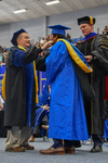 Provost Jay Gatrell, graduate, Dr. Ryan Hendrickson by Beverly J. Cruse