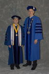 Mr. Eric Wilber, Student trustee, Dr. William L. Perry, President by Beverly J. Cruse