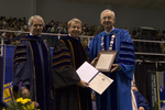 Dr. Blair M. Lord, Provost and Vice President for Academic Affairs, Dr. H. Ray Hoops, Honorary degree recipient, charge to the class, Dr. William L. Perry, President by Beverly J. Cruse