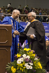 Dr. William L. Perry, President, Mr. Timothy D. McCollum, Charge to the class