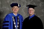 Dr. William L. Perry, President, Mr. Robert E. Holmes Jr., Honorary degree recipient by Beverly J. Cruse