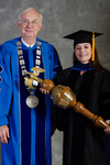 Dr. William L. Perry, President, Dr. Lisa Brooks, Commencement Marshal by Beverly J. Cruse
