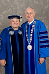 Mr. Roger L. Kratochvil , Member of Board of Trustees, Dr. William L. Perry, University President by Beverly J. Cruse