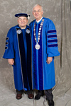 Mr. Roger L. Kratochvil , Member of Board of Trustees, Dr. William L. Perry, University President by Beverly J. Cruse