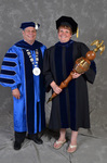Dr. David Glassman & Dr. Melanie Burns, Commencement Marshal & Students by Beverly J. Cruse