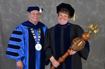 Dr. David Glassman & Dr. Melanie Burns, Commencement Marshal & Students by Beverly J. Cruse