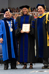 President Glassman, Dr. Heidi Larson, Luis Clay Mendez Distinguished Service Award winner, and Provost Gatrell by Beverly J. Cruse