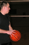 Student Playing Basketball in Student Recreation Center by Daily Eastern News