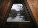 View Through the Window of the Jackson Truss Covered Bridge by Daily Eastern News
