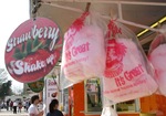 Vendor with Cotton Candy at Celebration Festival by Daily Eastern News