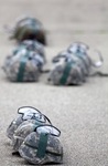 ROTC Helmets on the Concrete by Danny Damiani and Zachary White