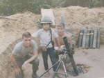 Vietnamese boy with American soldiers by Dan Ashenfelter