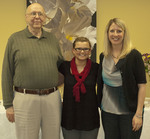 Amanda Long with Dr. Jerry Daniels and Dr. Dannelle Larson by Booth Library