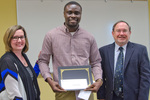 Pictured is award winner Kehinde Abiodun with Dr. Kristin Brown, chairwoman of the Library Advisory Board, and Dr. Allen Lanham, dean of library services by Beverly Cruse