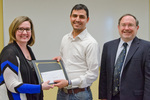 Pictured is award winner Hamid Lahouij with Dr. Kristin Brown, chairwoman of the Library Advisory Board, and Dr. Allen Lanham, dean of library services