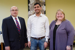 Pictured is Dr. Myhar Izadi, dean of the Lumpkin School of Business and Applied Science; award winner Hamid Lahouij; and Dr. Melody Wollan, associate chair of the School of Business