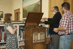 Librarian David Bell demonstrates a 1918-era Edison record player by Beth Heldebrandt