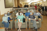 The audience learns the proper way to wear a flu mask by Beth Heldebrandt