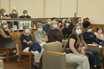 The audience learns the proper way to wear a flu mask by Beth Heldebrandt