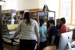 Elementary school kids visit the Parker exhibit