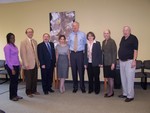 Ioanna Efthymiadou with EIU President William Perry and other members of EIU by Booth Library